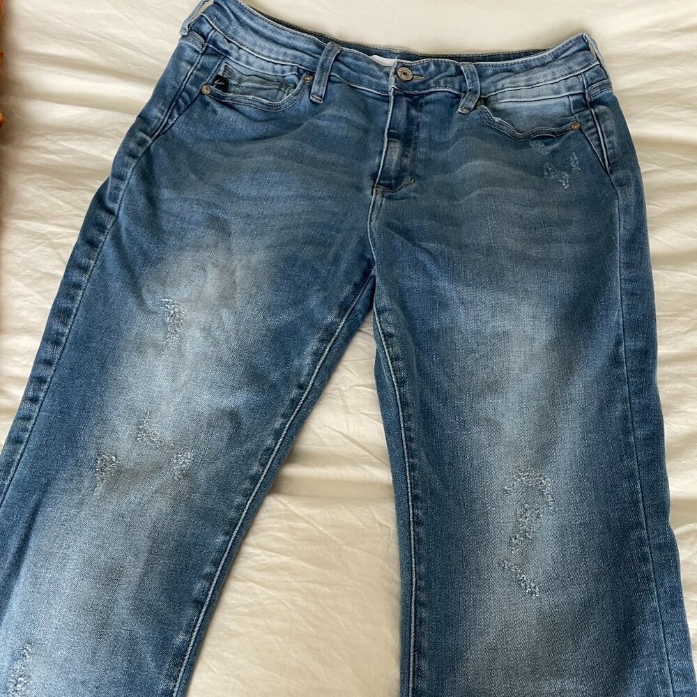 Bootcut jeans with frayed ends